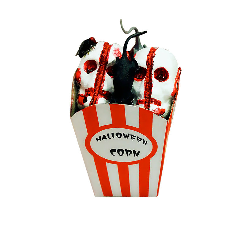 Halloween skull hanging decor suspended by a cord, featuring a detailed white skull design for seasonal display