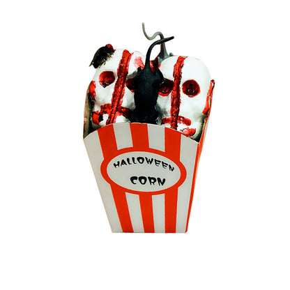 Halloween skull hanging decor suspended by a cord, featuring a detailed white skull design for seasonal display