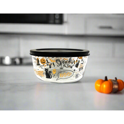 Dura Living Halloween 4-piece glass storage container set with round 32oz jars and matching lids, ideal for kitchen organization.
