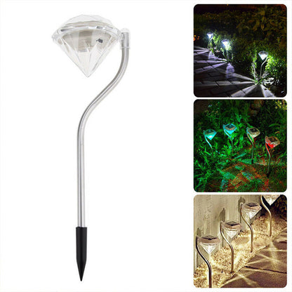Solar powered garden diamond light with faceted crystal design on a decorative stake