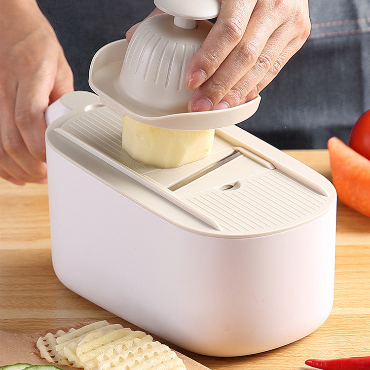 Kitchen vegetable slicer by My Store, shown in a compact handheld design