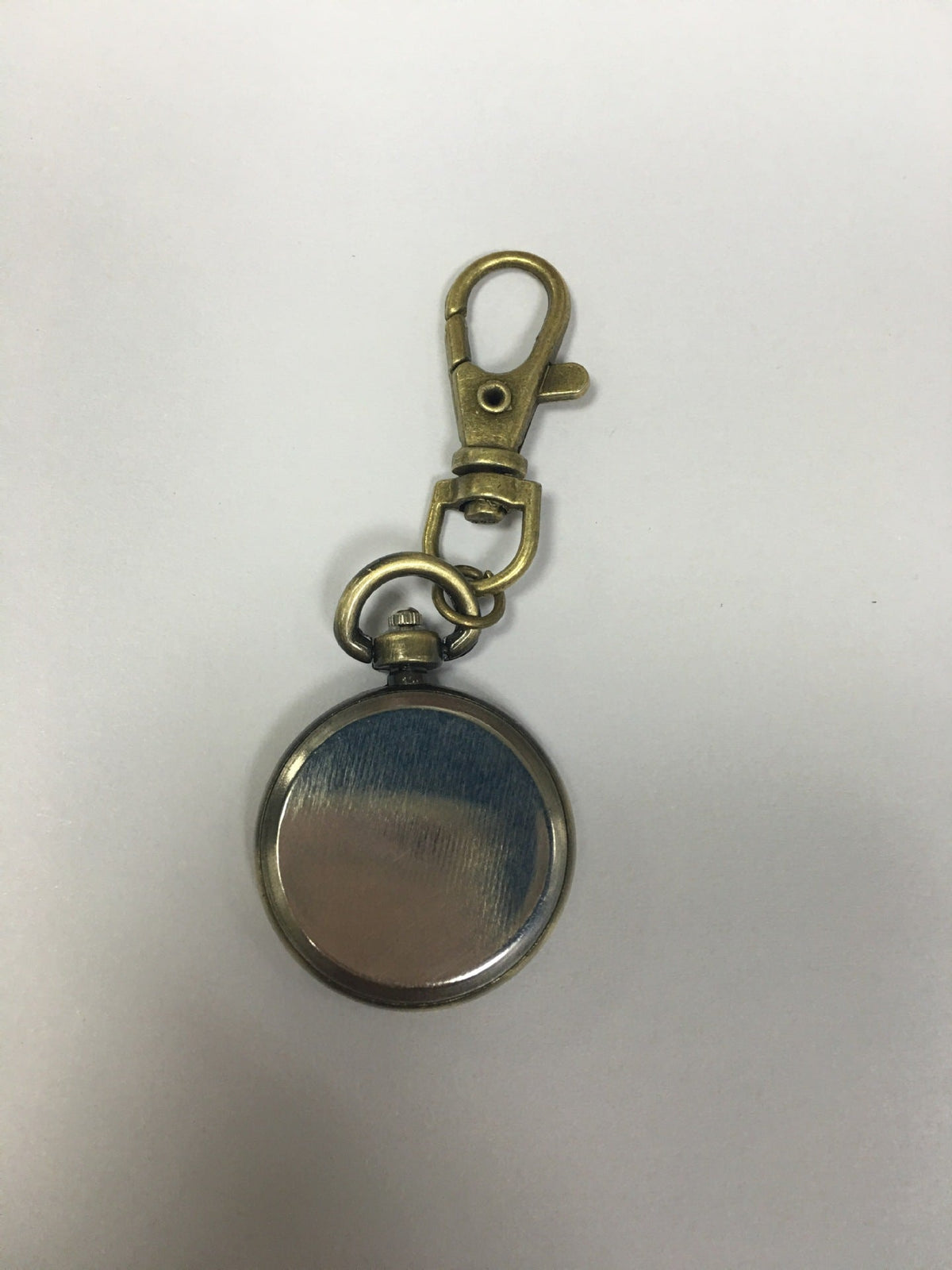 Vintage pocket watch with classic design and visible watch face