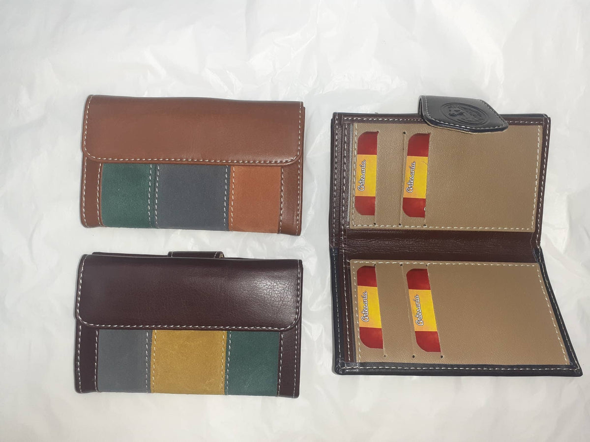 Handmade women's wallet with elegant leather design, featuring multiple card slots and a secure coin pocket.