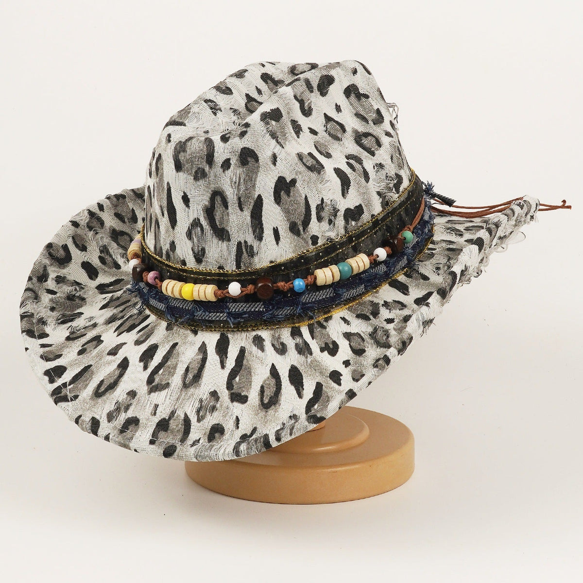 Wool ethnic-style women's leopard-print hat, close-up view of patterned fabric and brim