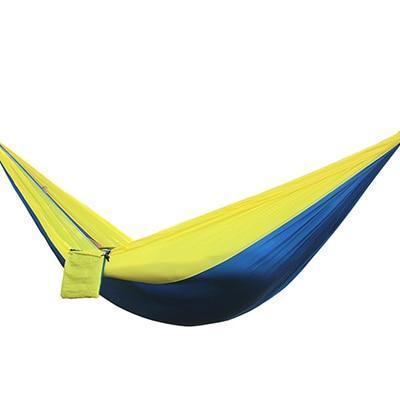 Portable nylon parachute backpacking double hammock in outdoor suspension setup