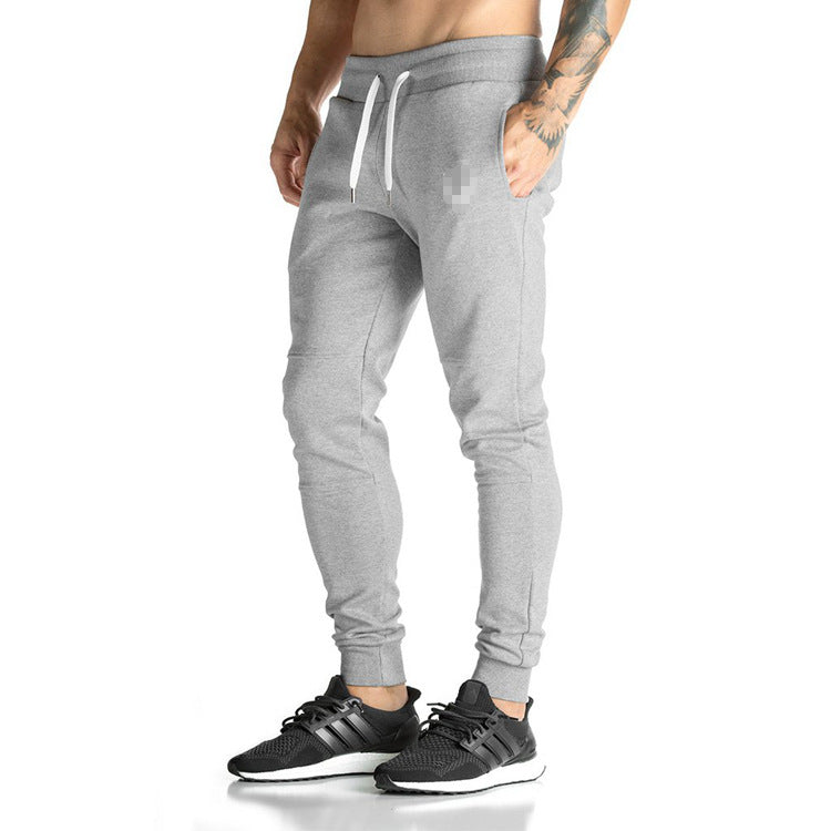 Black running training pants by My Store, lightweight athletic design with elastic waistband and tapered legs