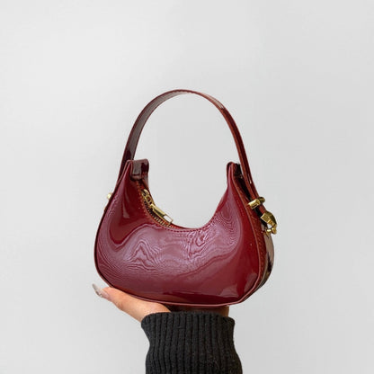 French-style niche luxury handbag in a refined silhouette, showcasing elegant details and premium craftsmanship