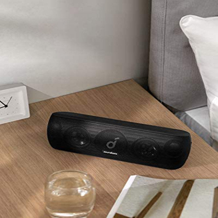 Black Bluetooth subwoofer speaker with compact design and visible control panel