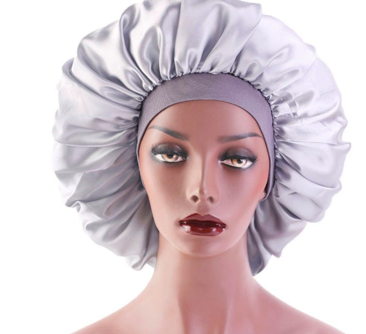 Beauty print satin silk bonnet sleep night cap in colorful patterned fabric, front view