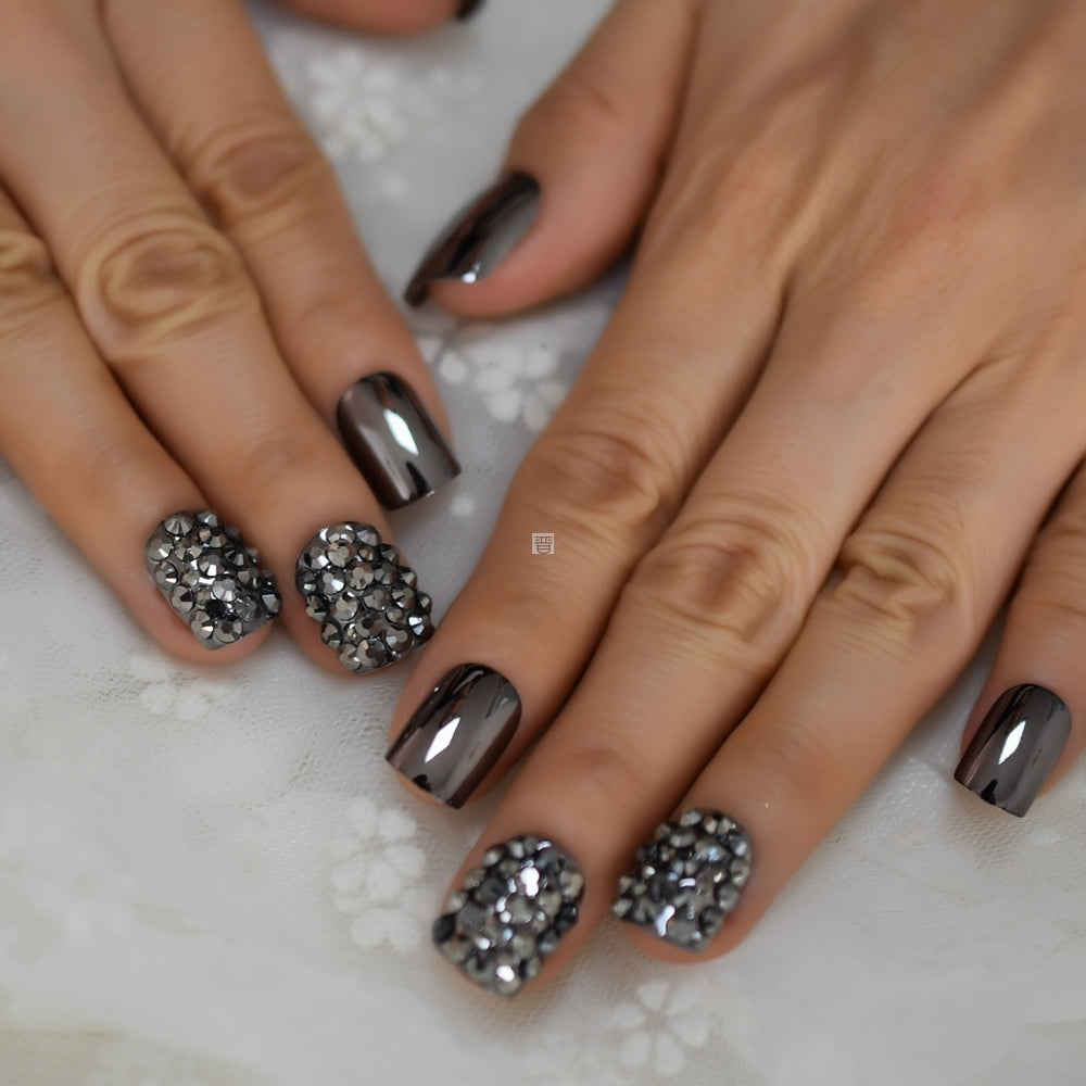Metal false nails for women in a sleek metallic design, close-up product view