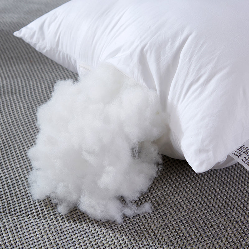 Large throw pillow sofa cushion pillow core in white fabric, photographed against a plain background