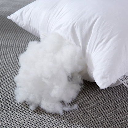 Large throw pillow sofa cushion pillow core in white fabric, photographed against a plain background