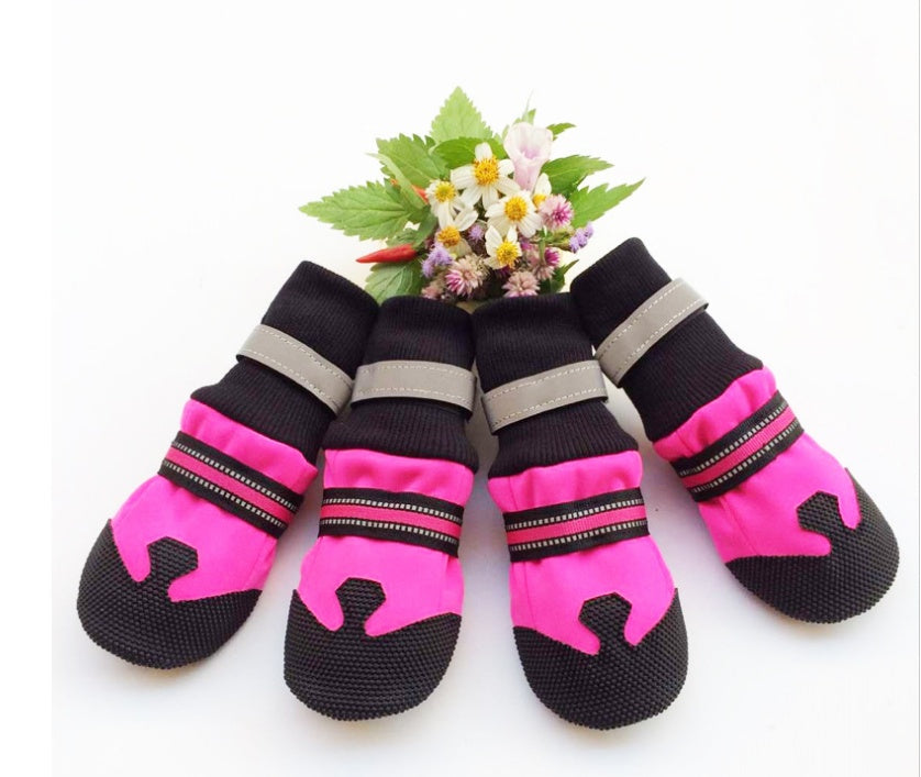 Waterproof dog boots for large and medium dogs, durable paw protection in black with adjustable straps