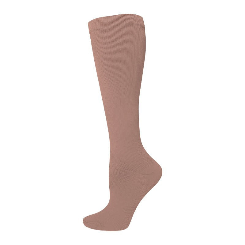 Women's calf-length compression socks displayed in a pair