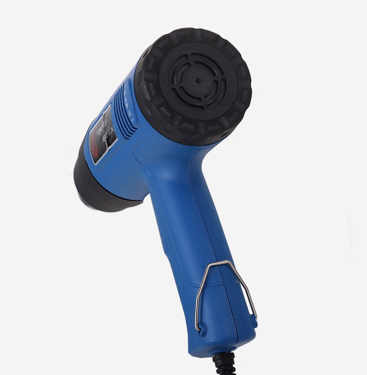 Industrial heat gun displayed in black and yellow with ergonomic handle and adjustable nozzle