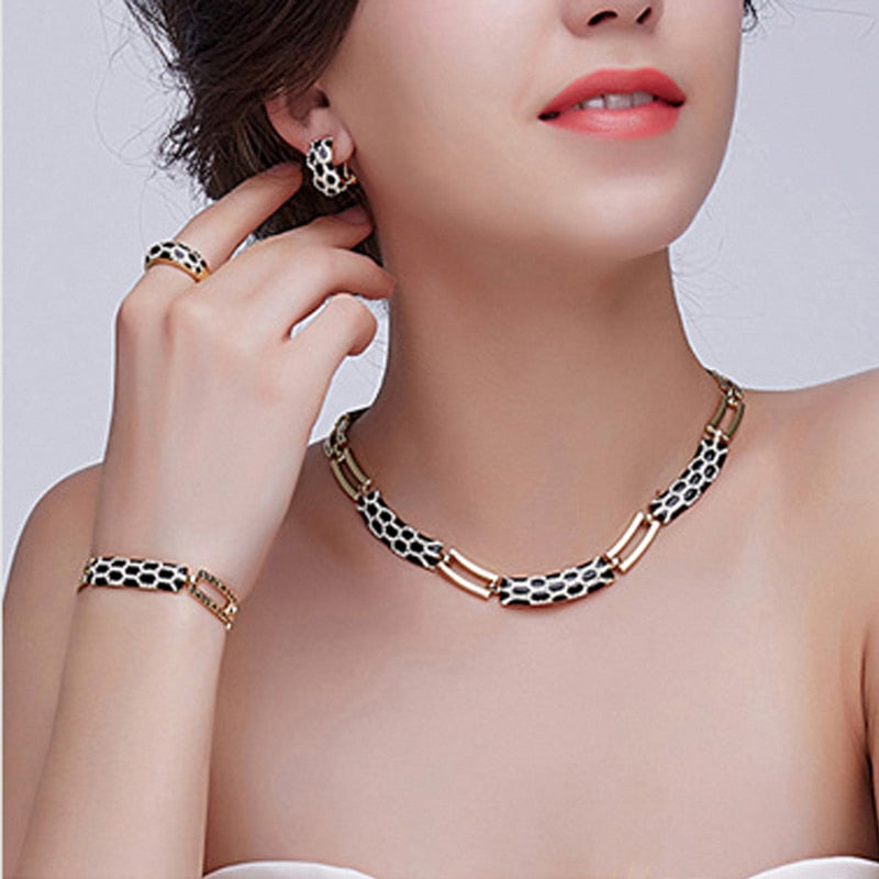 Korean-style diamond earring and necklace set displayed together, elegant matching jewelry design