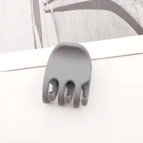 Trumpet clip card issue product image featuring a trumpet-shaped clip card holder