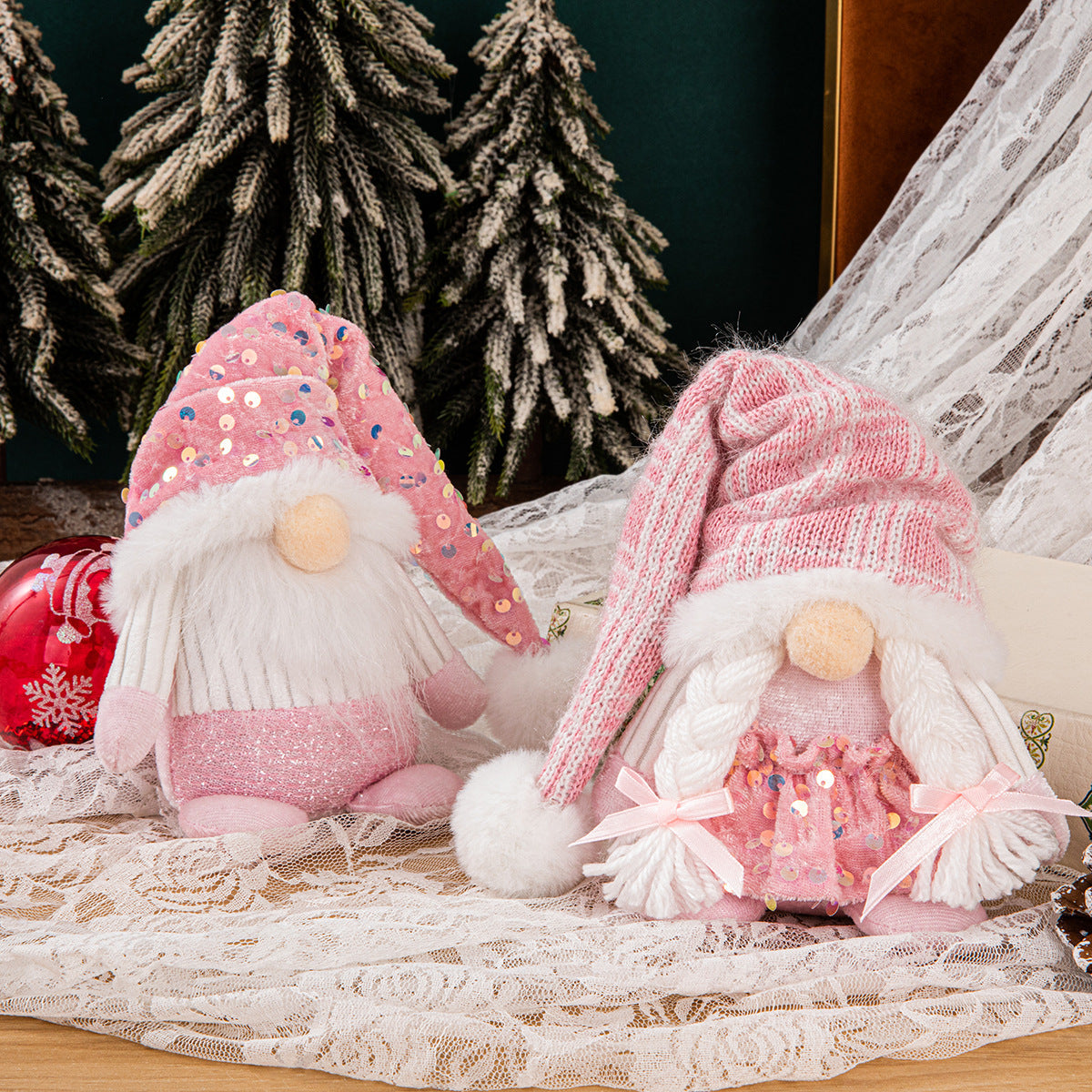 Christmas decorations sequin couple ornaments displayed together in festive holiday style