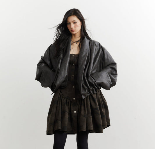 Gender-neutral pleated silhouette ebony-brown faux leather PU jacket with structured detailing