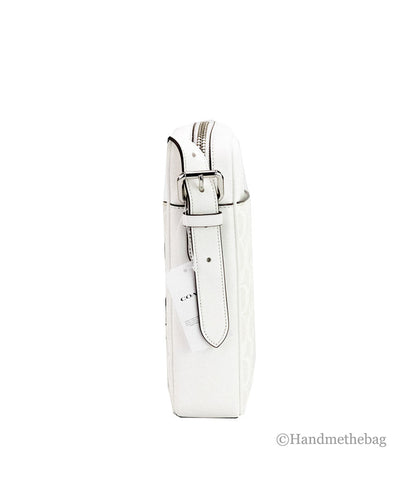 Coach Hudson 21 medium handbag with chalk trompe l'oeil print, featuring a structured shape and top handle.