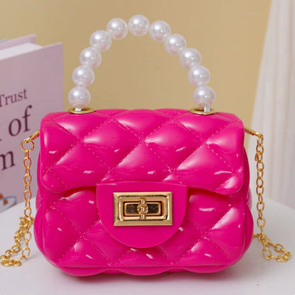 Pearl hand one-shoulder crossbody chain children's bag with decorative pearl handle and strap