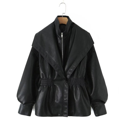 Women's loose leather jacket with turn-down collar, front pockets, and relaxed fit