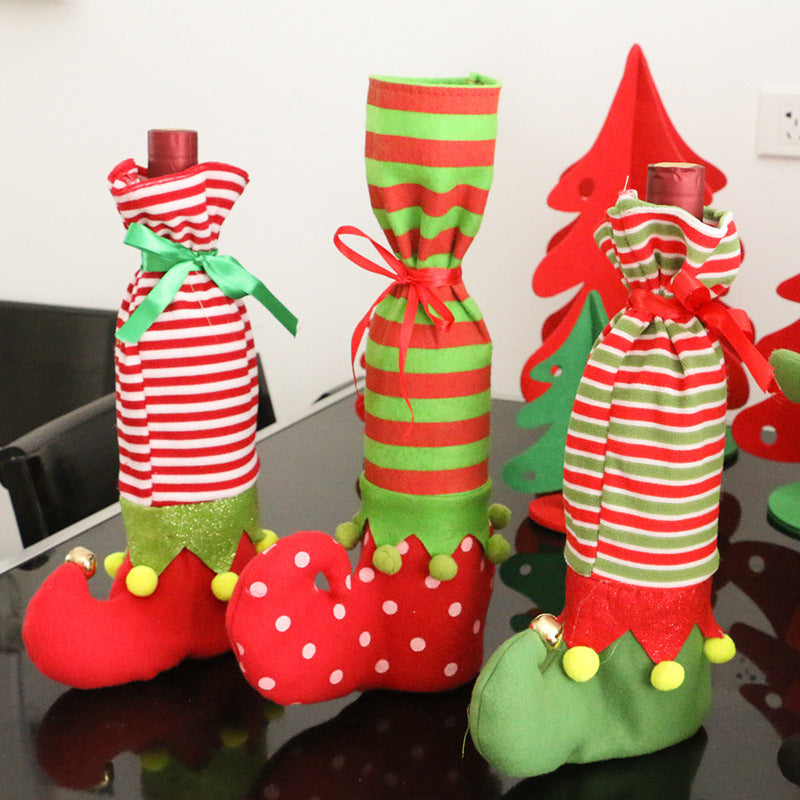 Striped Christmas wine bottle decoration set with festive red and white holiday designs