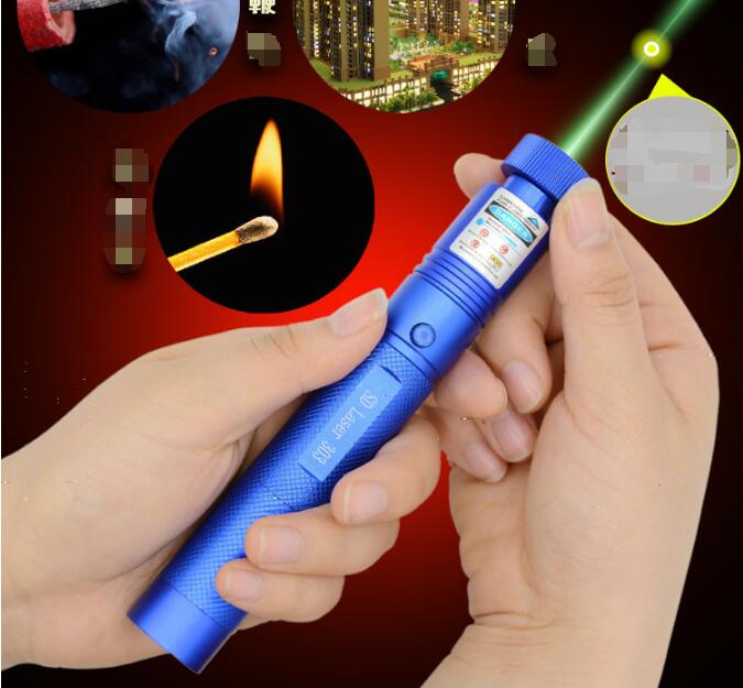 Green light laser flashlight with black handheld body emitting a bright green beam