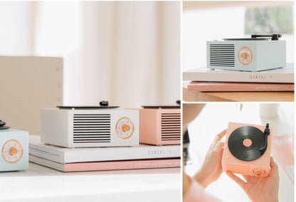 Retro vinyl Bluetooth wireless small sound speaker with classic record-player design and visible speaker grille
