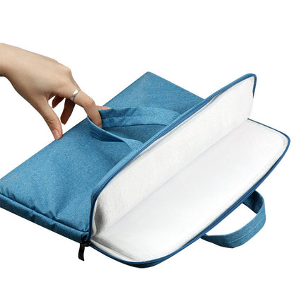 Black laptop bag compatible with Apple laptops, featuring a protective padded design and carry handles