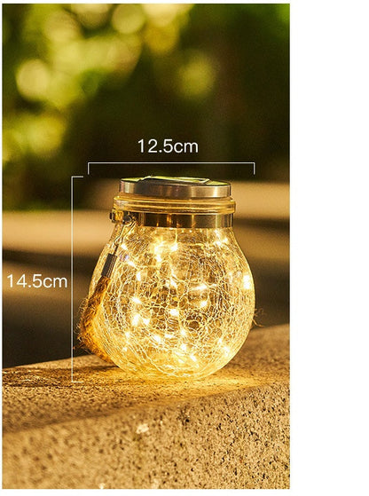 Crack ball glass jar light with textured globe design and warm LED illumination