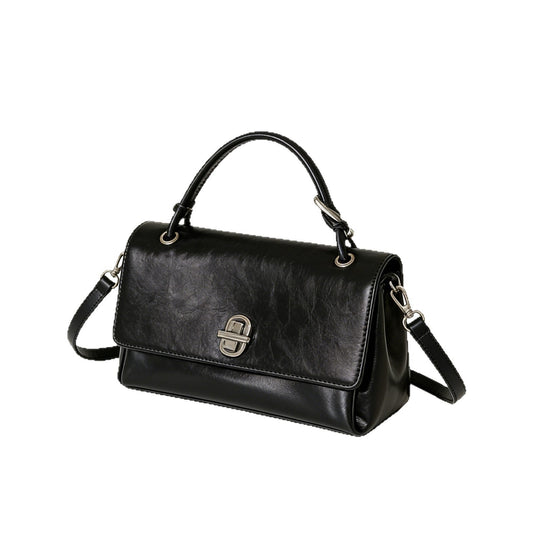 Custom top-grain leather women's handbag with versatile crossbody and shoulder straps in a simple, elegant design