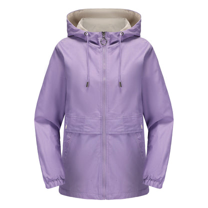 Women's hooded solid color trench coat in a classic longline design