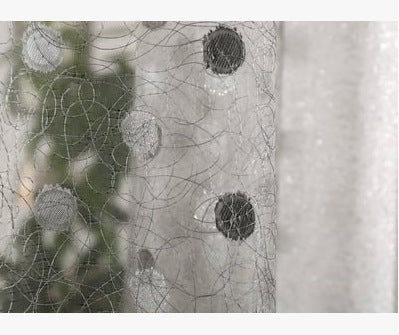 Simple blackout curtains in a plain design, displayed as a window panel