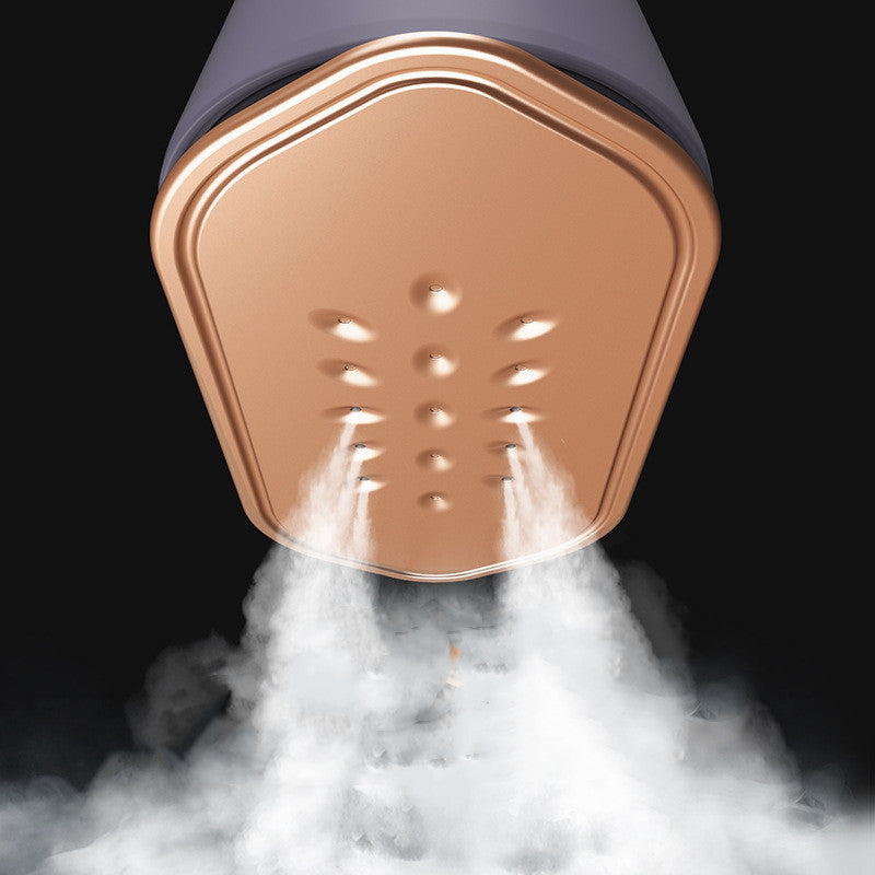 Small handheld steam iron by Sell My Stuff, perfect for home and travel, used to press and smooth clothes efficiently.