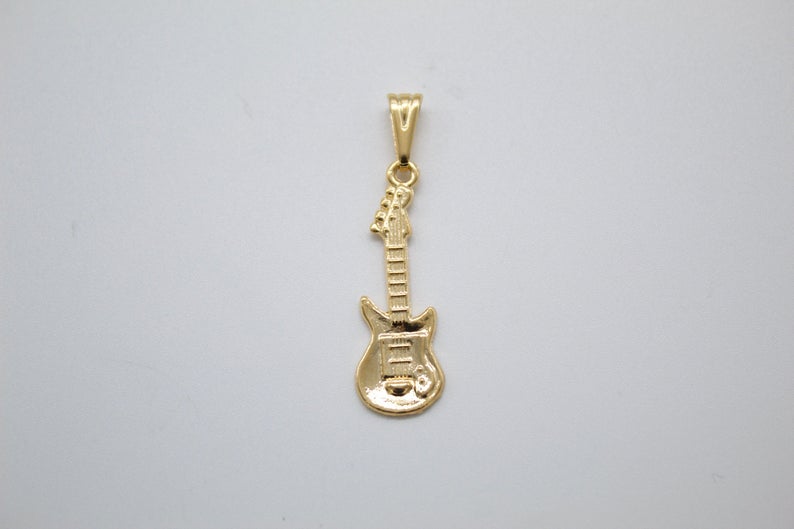 18K gold filled bass electric guitar pendant by MIA Jewelry, detailed jewelry accessory with musical instrument design.