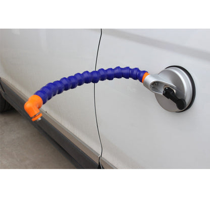 Dent repair tool for vehicle bodywork with ergonomic handle and metal pulling tip