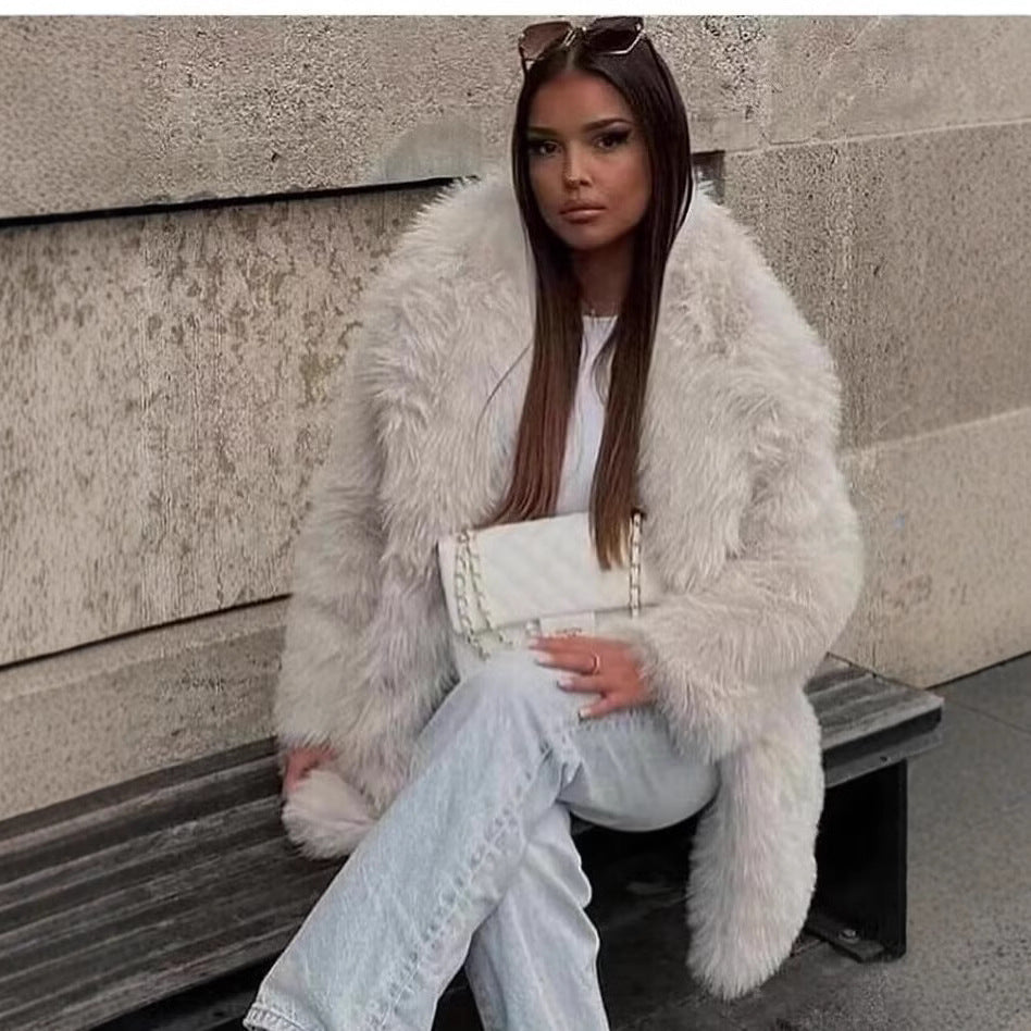Women's artificial fur warm thick coat in a plush textured design