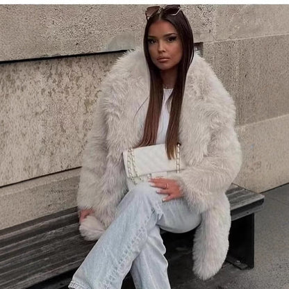 Women's artificial fur warm thick coat in a plush textured design
