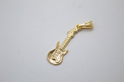 18K gold filled bass electric guitar pendant by MIA Jewelry, showcasing a detailed mini guitar with shiny gold finish.