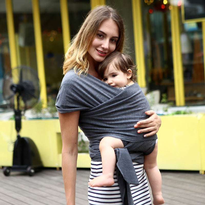 Solid color baby sling carrier for infants, adjustable fabric wrap design
