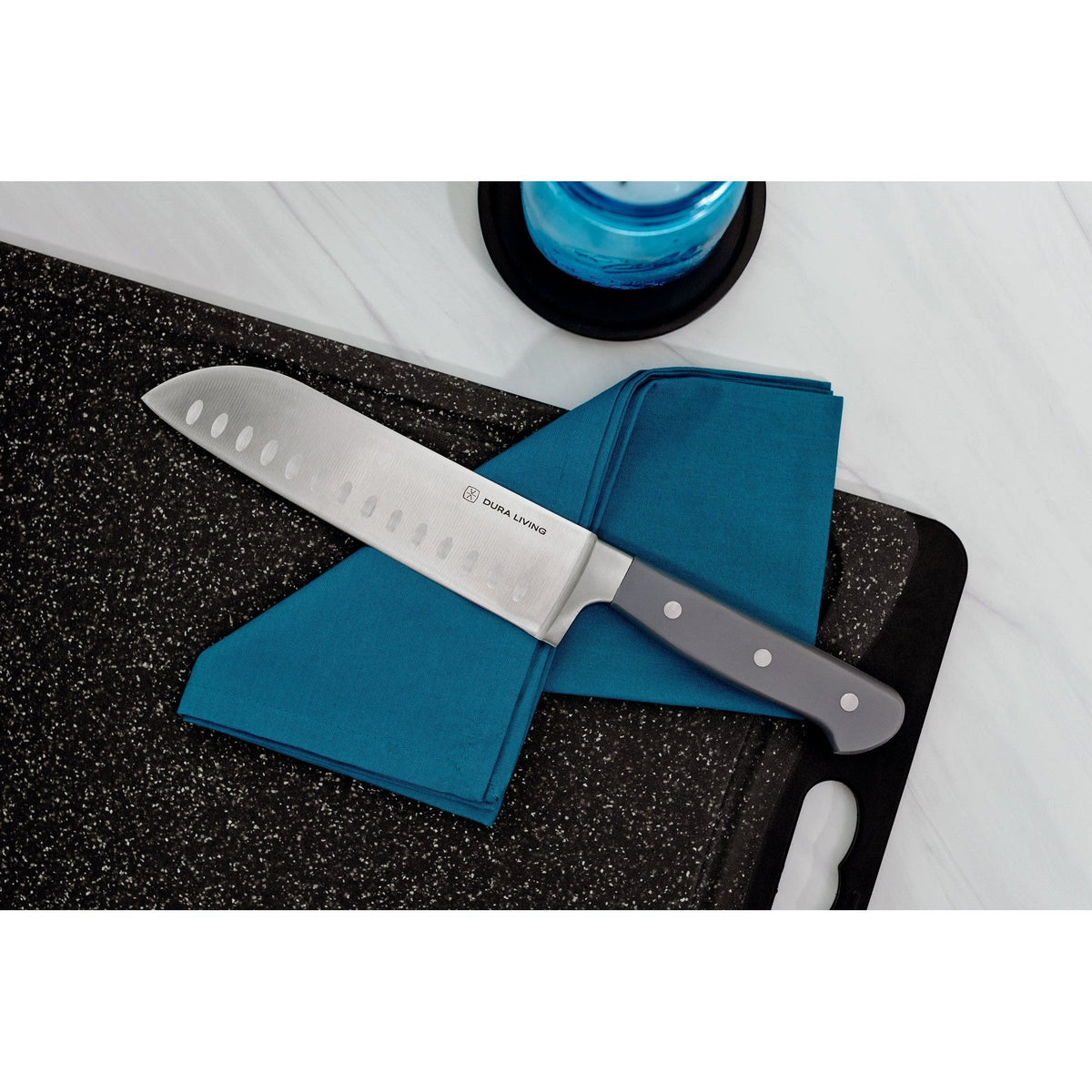 Dura Living Superior 7-inch gray Santoku Knife with sharp blade and ergonomic handle, ideal for precise slicing and dicing.