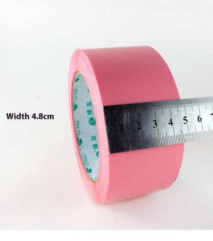 Transparent tape roll from Tape Color, shown in clear plastic packaging