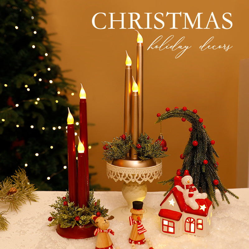 LED electronic candle Christmas decoration emitting a warm glow, shown as a festive holiday ornament