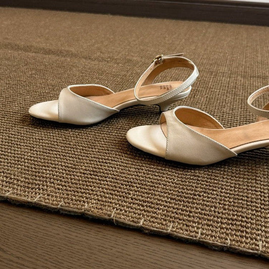 Green women’s retro sandals with minimalist design, comfortable kitten heel, and elegant daily commute style