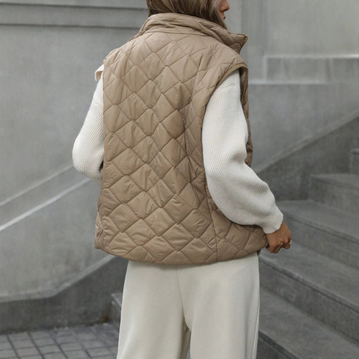 Women’s zippered vest with stand collar, sleeveless waistcoat in a sleek design