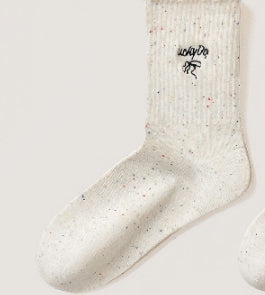 Women's embroidered ruffle-ankle socks in soft fabric with decorative detailing
