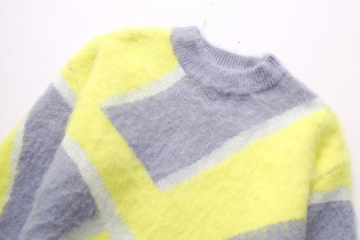 Women's winter fashion pullover with patchwork wool design, front view