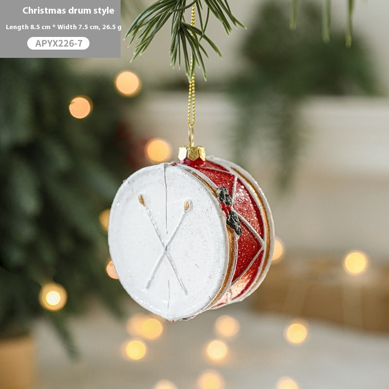 Painted plastic Christmas tree pendant decoration in a festive holiday design