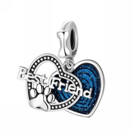 Jewelry beads pendant close-up with colorful decorative beads and a central hanging design